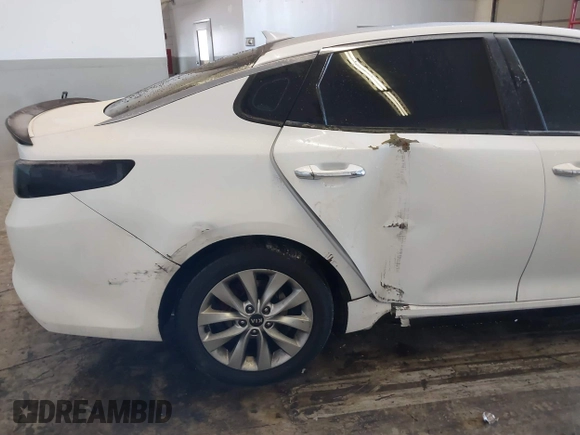 2016 Kia Optima SX Turbo with VIN 5XXGW4L23GG016526, listed as a IAAI auction lot 41428139 with 112,603 mi miles and . Bid and sale history available at carsss.com. Image 18.
