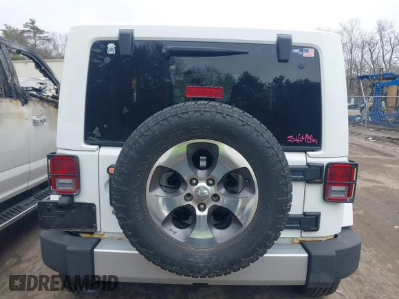 2011 Jeep Wrangler Sahara with VIN 1J4AA5D15BL538240, listed as a IAAI auction lot 41793836 with 172,528 mi miles and . Bid and sale history available at carsss.com. Image 16.