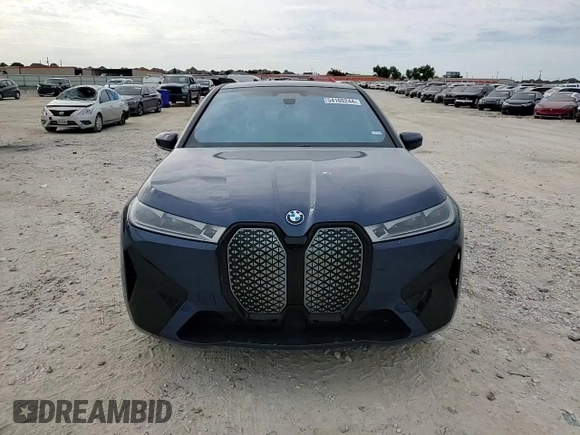 2023 BMW iX M60 with VIN WB533CF01PCM29925, listed as a Copart auction lot 54160244 with 8,226 mi miles and Salvage Title. Bid and sale history available at carsss.com. Image 12.