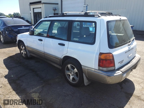 1999 Subaru Forester S with VIN JF1SF6557XH703160, listed as a Copart auction lot 60076974 with 0 mi miles and Salvage Title. Bid and sale history available at carsss.com. Image 2.