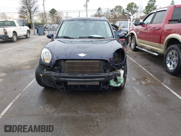 2013 MINI Countryman S ALL4 z VIN WMWZC5C51DWM15816, wystawiony jako IAAI lot #41734311 z przebiegiem 134 636 mil mil oraz . Historia ofert i sprzedaży dostępna na DreamBid. Obrazek 6.