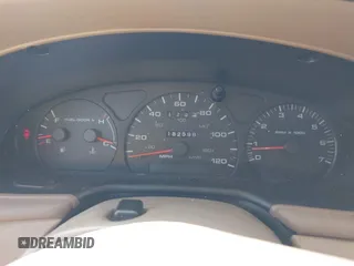 2003 Ford Taurus SE Standard z VIN 1FAFP53UX3A228383, wystawiony jako IAAI lot #42700752 z przebiegiem 182 598 mil mil oraz . Historia ofert i sprzedaży dostępna na DreamBid. Obrazek 7.