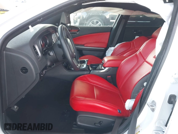 2023 Dodge Charger Scat Pack Widebody with VIN 2C3CDXGJ6PH635498, listed as a IAAI auction lot 41448100 with 13,678 mi miles and . Bid and sale history available at DreamBid. Image 5.
