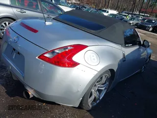 2012 Nissan 370Z Touring with VIN JN1AZ4FH4CM371189, listed as a IAAI auction lot 41088025 with 74,076 mi miles. Bid and sale history available at carsss.com. Image 4.
