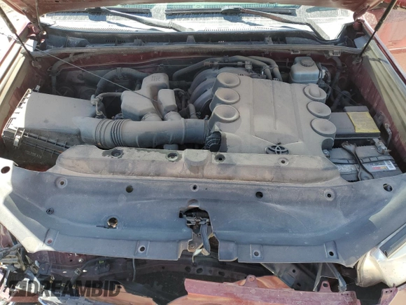 2011 Toyota 4Runner Trail z VIN JTEBU5JR4B5074126, wystawiony jako Copart lot #57718015 z przebiegiem 232 870 mil mil oraz Szkoda całkowita • Salvage title. Historia ofert i sprzedaży dostępna na DreamBid. Obrazek 12.