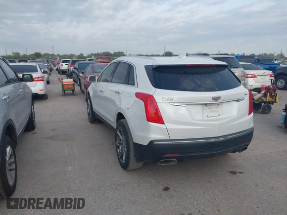 2017 Cadillac XT5 Luxury FWD with VIN 1GYKNBRS2HZ108745, listed as a IAAI auction lot 42022579 with 147,413 mi miles. Bid and sale history available at carsss.com. Image 3.