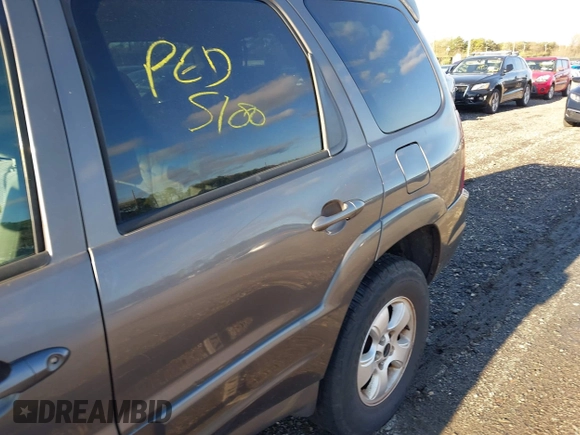 2003 Mazda Tribute LX with VIN 4F2CZ94133KM52401, listed as a IAAI auction lot 42142297 with Not Provided miles and . Bid and sale history available at carsss.com. Image 6.