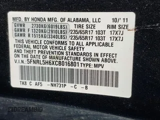 2012 Honda Odyssey EX-L with VIN 5FNRL5H6XCB016801, listed as a IAAI auction lot 42112141 with 164,671 mi miles and . Bid and sale history available at carsss.com. Image 9.
