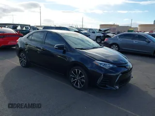 2017 Toyota Corolla L z VIN 5YFBURHE7HP649992, wystawiony jako IAAI lot #41379887 z przebiegiem 94 725 mil mil oraz . Historia ofert i sprzedaży dostępna na DreamBid. Obrazek 1.