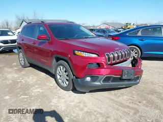 2015 Jeep Cherokee Limited with VIN 1C4PJMDS1FW646135, listed as a IAAI auction lot 41991811 with 123,229 mi miles. Bid and sale history available at carsss.com. Image 1.
