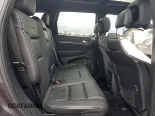 2015 Jeep Grand Cherokee Summit with VIN 1C4RJFJM7FC928257, listed as a Copart auction lot 82525714 with 148,208 mi miles and Salvage Title. Bid and sale history available at carsss.com. Image 11.