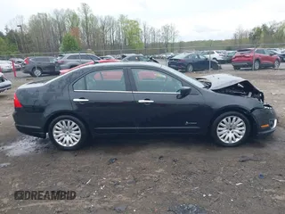 2010 Ford Fusion Hybrid with VIN 3FADP0L38AR263525, listed as a IAAI auction lot 41952084 with 112,681 mi miles. Bid and sale history available at carsss.com. Image 13.
