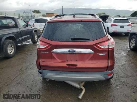2016 Ford Escape Titanium with VIN 1FMCU9J91GUA99767, listed as a Copart auction lot 51172655 with 132,911 mi miles and Salvage title. Bid and sale history available at DreamBid. Image 6.