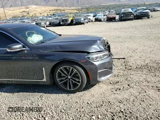 2020 BMW 7 Series 750i xDrive with VIN WBA7U2C05LGM27144, listed as a Copart auction lot 77827854 with 0 mi miles and Salvage Title. Bid and sale history available at carsss.com. Image 11.