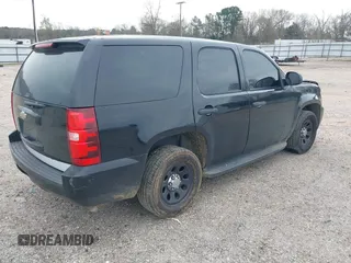 2011 Chevrolet Tahoe Commercial with VIN 1GNLC2E01BR289534, listed as a IAAI auction lot 41670183 with 119,422 mi miles and . Bid and sale history available at DreamBid. Image 4.