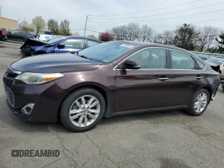 2014 Toyota Avalon Limited with VIN 4T1BK1EB7EU125687, listed as a Copart auction lot 52955645 with 99,108 mi miles and Salvage Title. Bid and sale history available at carsss.com. Image 1.