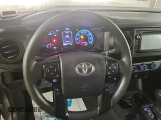 2018 Toyota Tacoma SR with VIN 5TFSX5EN6JX062775, listed as a IAAI auction lot 42774090 with 146,583 mi miles and . Bid and sale history available at DreamBid. Image 14.