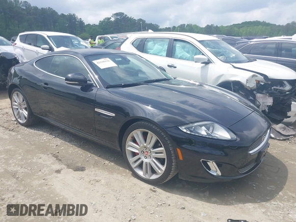 2012 Jaguar XK with VIN SAJWA4FB8CLB47049, listed as a IAAI auction lot 42118136 with 60,953 mi miles. Bid and sale history available at carsss.com. Image 13.