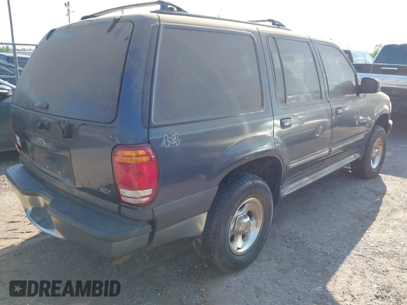 1999 Ford Explorer XL with VIN 1FMZU34XXXUB25039, listed as a IAAI auction lot 42290828 with 146,874 mi miles and . Bid and sale history available at DreamBid. Image 4.