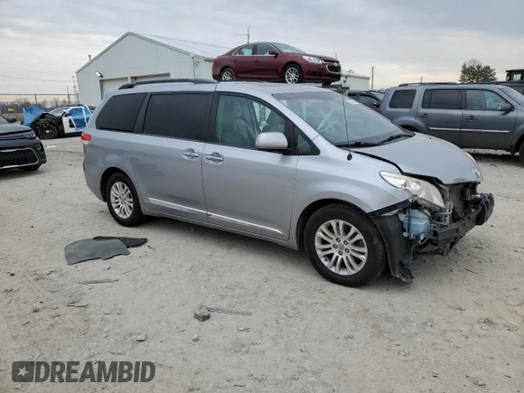 2014 Toyota Sienna XLE with VIN 5TDYK3DC2ES434962, listed as a Copart auction lot 50240815 with 150,503 mi miles and Salvage Title. Bid and sale history available at carsss.com. Image 4.