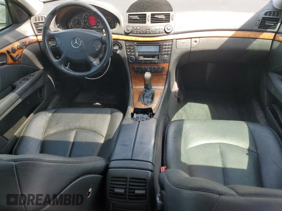 2003 Mercedes-Benz E-Class 3.2L with VIN WDBUF65J83A148754, listed as a Copart auction lot 54560835 with 106,714 mi miles and Salvage Title. Bid and sale history available at carsss.com. Image 8.