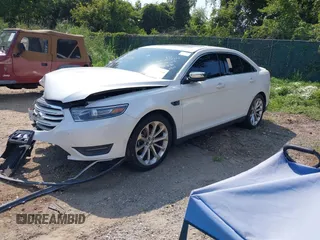 2014 Ford Taurus Limited with VIN 1FAHP2F8XEG181491, listed as a IAAI auction lot 40277144 with 107,374 mi miles. Bid and sale history available at carsss.com. Image 2.