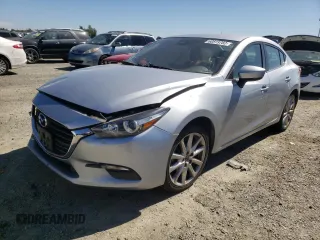2017 Mazda 3 Touring z VIN 3MZBN1V79HM119726, wystawiony jako Copart lot #60819782 z przebiegiem 108 939 mil mil oraz Szkoda całkowita • Salvage title. Historia ofert i sprzedaży dostępna na DreamBid. Obrazek 2.