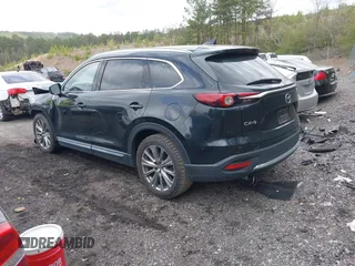 2021 Mazda CX-9 Carbon Edition with VIN JM3TCADY4M0517535, listed as a IAAI auction lot 41821261 with 60,053 mi miles. Bid and sale history available at carsss.com. Image 3.