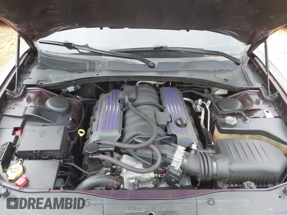 2021 Dodge Charger Scat Pack Widebody with VIN 2C3CDXGJ5MH579324, listed as a IAAI auction lot 41399676 with 77,156 mi miles and . Bid and sale history available at DreamBid. Image 10.