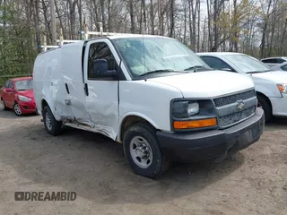 2014 Chevrolet Express Cargo Van with VIN 1GCWGFCA7E1110011, listed as a IAAI auction lot 41983301 with 114,827 mi miles. Bid and sale history available at carsss.com. Image 1.