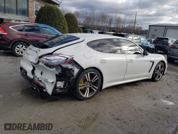 2014 Porsche Panamera z VIN WP0AA2A74EL010108, wystawiony jako Copart lot #85194254 z przebiegiem 77 568 mil mil oraz Czysty tytuł • Clean title. Historia ofert i sprzedaży dostępna na DreamBid. Obrazek 3.