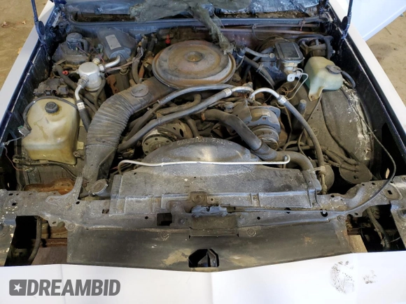 1988 Chevrolet Monte Carlo z VIN 1G1GZ11G3JP115201, wystawiony jako Copart lot #75502454 z przebiegiem 71 006 mil mil oraz Szkody całkowita. Historia ofert i sprzedaży dostępna na DreamBid. Obrazek 11.