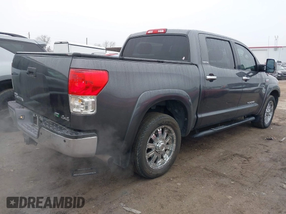 2012 Toyota Tundra 4WD Truck LTD with VIN 5TFHW5F17CX211075, listed as a IAAI auction lot 41510976 with 204,930 mi miles. Bid and sale history available at carsss.com. Image 4.