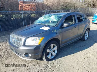 2012 Dodge Caliber SXT z VIN 1C3CDWDA6CD506571, wystawiony jako IAAI lot #41845451 z przebiegiem 99 496 mil mil oraz . Historia ofert i sprzedaży dostępna na DreamBid. Obrazek 2.