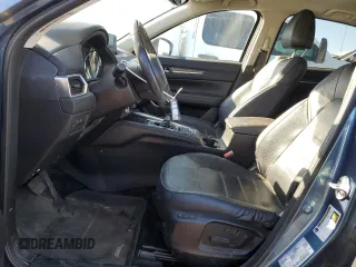 2018 Mazda CX-5 Grand Touring with VIN JM3KFBDM9J0323388, listed as a Copart auction lot 47628135 with 102,098 mi miles and Salvage Title. Bid and sale history available at carsss.com. Image 7.