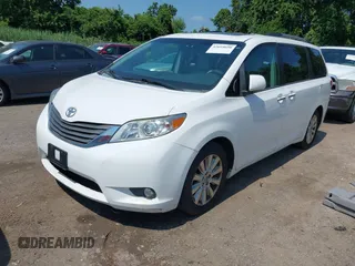 2014 Toyota Sienna Limited with VIN 5TDDK3DC3ES079590, listed as a IAAI auction lot 42694690 with 189,456 mi miles and . Bid and sale history available at DreamBid. Image 2.