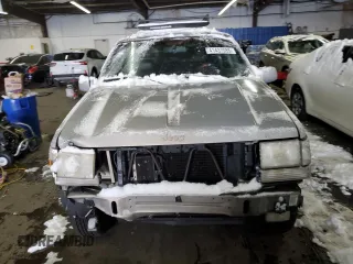 1997 Jeep Grand Cherokee Limited with VIN 1J4GZ78Y1VC706353, listed as a Copart auction lot 41437085 with 163,675 mi miles and Salvage Title. Bid and sale history available at carsss.com. Image 5.