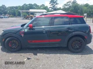 2023 MINI Countryman John Cooper Works z VIN WMZ33BS09P3R00627, wystawiony jako IAAI lot #42419212 z przebiegiem 12 260 mil mil oraz . Historia ofert i sprzedaży dostępna na DreamBid. Obrazek 14.
