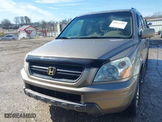 2004 Honda Pilot EX with VIN 2HKYF18574H578967, listed as a IAAI auction lot 41622715 with 150,803 mi miles. Bid and sale history available at carsss.com. Image 12.