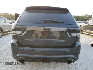 2012 Jeep Grand Cherokee SRT8 with VIN 1C4RJFDJ2CC329621, listed as a Copart auction lot 86772154 with 236,800 mi miles and Salvage Title. Bid and sale history available at carsss.com. Image 6.