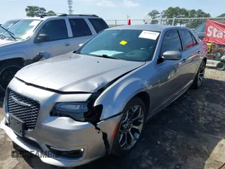 2018 Chrysler 300 with VIN 2C3CCABGXJH243837, listed as a IAAI auction lot 41748996 with 167,978 mi miles. Bid and sale history available at carsss.com. Image 2.