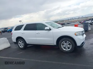 2013 Dodge Durango SXT with VIN 1C4RDJAG7DC659050, listed as a IAAI auction lot 42637236 with 162,458 mi miles and . Bid and sale history available at DreamBid. Image 13.