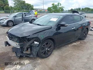 2016 Nissan Maxima SR with VIN 1N4AA6AP2GC901904, listed as a IAAI auction lot 42523722 with 114,235 mi miles and . Bid and sale history available at DreamBid. Image 18.