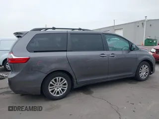 2015 Toyota Sienna XLE with VIN 5TDYK3DC6FS672329, listed as a IAAI auction lot 41908974 with 117,950 mi miles. Bid and sale history available at carsss.com. Image 13.