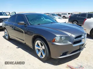 2014 Dodge Charger SXT z VIN 2C3CDXHG3EH339404, wystawiony jako IAAI lot #42072957 z przebiegiem 125 183 mil mil oraz . Historia ofert i sprzedaży dostępna na DreamBid. Obrazek 1.