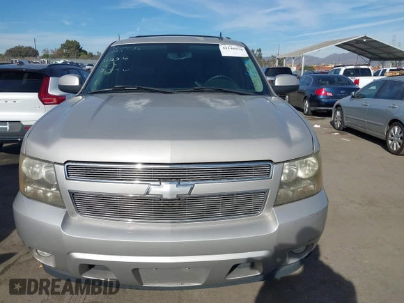 2007 Chevrolet Tahoe LTZ with VIN 1GNFC13077J399911, listed as a IAAI auction lot 41141878 with Not provided miles and . Bid and sale history available at DreamBid. Image 11.