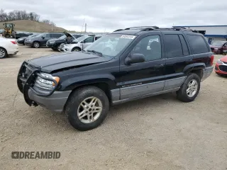 2000 Jeep Grand Cherokee Laredo z VIN 1J4GW48S2YC336733, wystawiony jako Copart lot #54553315 z przebiegiem 284 402 mil mil oraz Nie do naprawy • Non repairable. Historia ofert i sprzedaży dostępna na DreamBid. Obrazek 1.