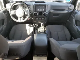 2017 Jeep Wrangler Sport with VIN 1C4AJWAGXHL715362, listed as a Copart auction lot 51262305 with 62,297 mi miles and Salvage Title. Bid and sale history available at DreamBid. Image 8.