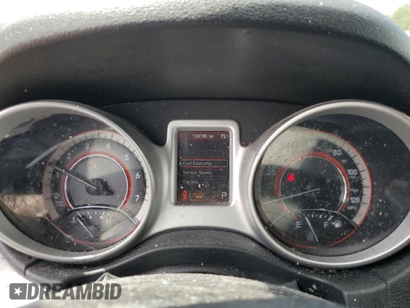 2014 Dodge Journey SXT z VIN 3C4PDCBG8ET115115, wystawiony jako Copart lot #56632555 z przebiegiem 139 785 mil mil oraz Szkoda całkowita • Salvage title. Historia ofert i sprzedaży dostępna na DreamBid. Obrazek 9.