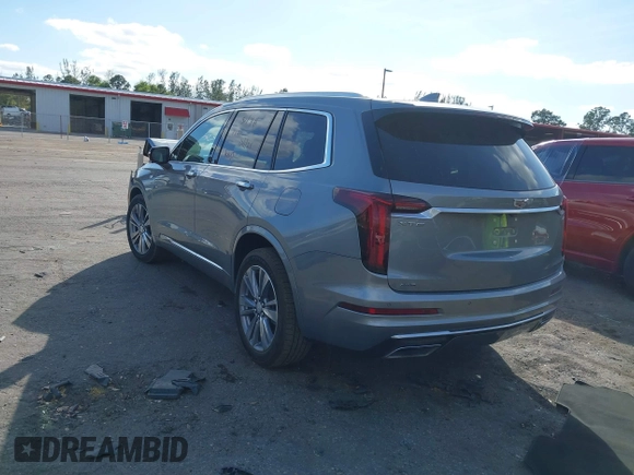 2023 Cadillac XT6 AWD Premium Luxury with VIN 1GYKPDRS0PZ158595, listed as a IAAI auction lot 41051122 with 39,653 mi miles and . Bid and sale history available at DreamBid. Image 3.